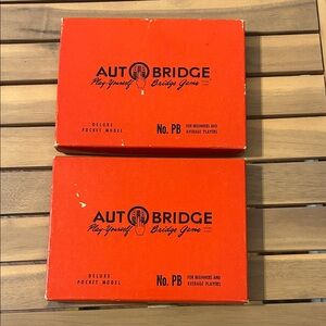 Set of two Auto Bridge play yourself game. Pocket model.